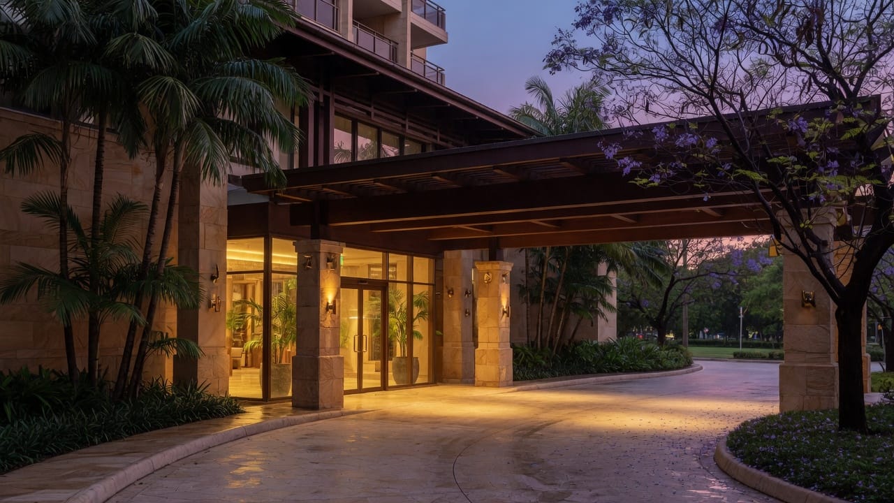 Porte-cochere of a finished apartment building at dusk